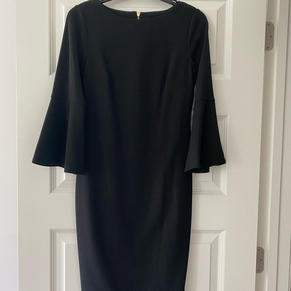 Black Calvin Klein dress with gold zipper